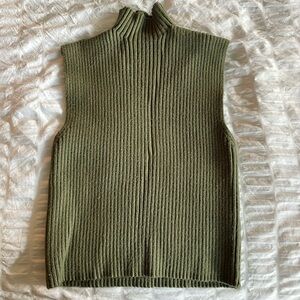 Green sleeveless sweater from Zara
